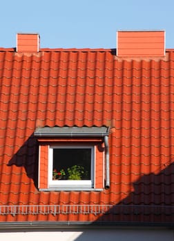red roof, window, chimneys