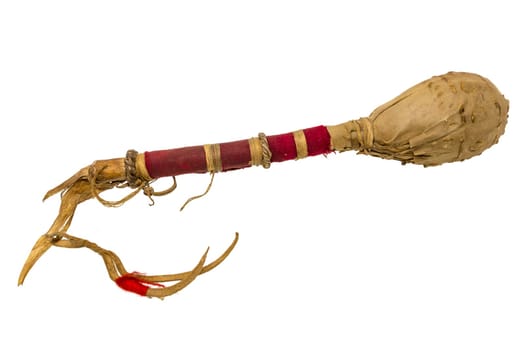 Indian rattle or drum mallets made of rawhide / leather wrapped in red fabric, isolated on white