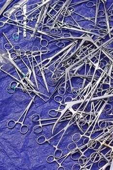 Big collection of various medical scissors equipment