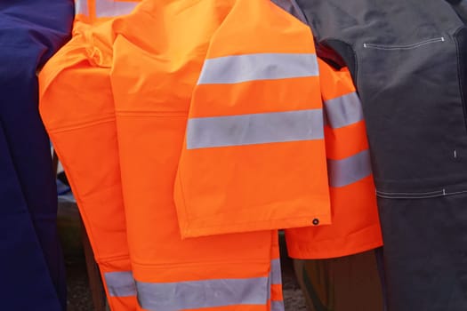 Reflective orange safety clothing for work
