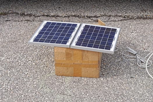 Double solar panel cells at box outside