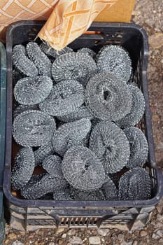 Big bunch of new steel wool in crate