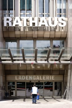 Bad Homburg,Germany - May 19,2018: An unknown man walks into the entrance of the shopping center Rathaus Ladengalerie on May 19,2018 in Bad Homburg.