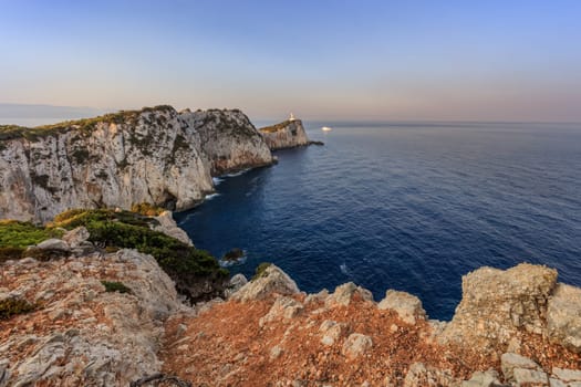 Lighthouse during sunrise. Cape Doukato, Lefkada island, Greece