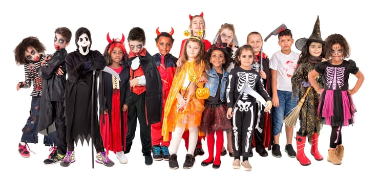 Group of kids in Halloween/Carnaval costumes isolated