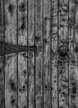 Old wooden doors with ring knocker