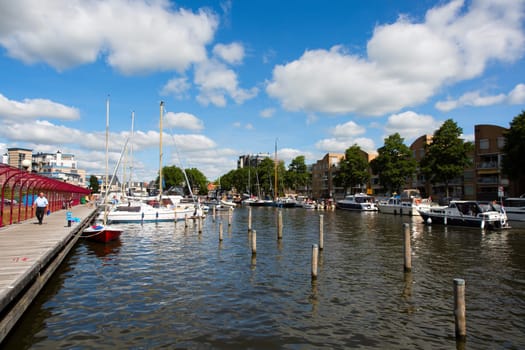 Sneek, Friesland, The Netherlands - August 5, 2018  Ships are anchored in the Sneek Marina during the Sneekweek 2018 in Sneek, Friesland, the Netherlands.
