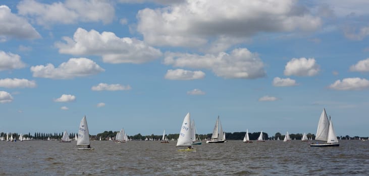 Sneek, Friesland, The Netherlands - August 5, 2018  Sailing ships at the Sneek Lake during the Sneekweek 2018 Regatta in Sneek, Friesland, The Netherlands.