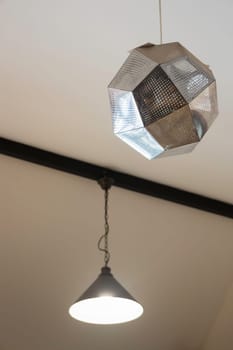 Illuminated ceiling warm light lamp, stock photo