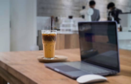 Comfortable work desk with notebook laptop, stock photo