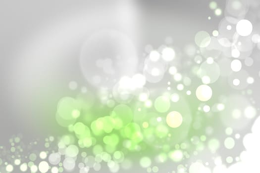Abstract blurred silver and white bokeh lights snowfall defocused.