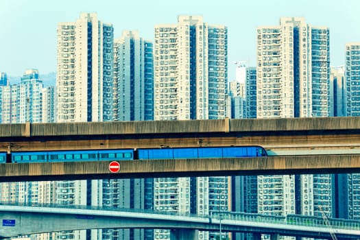 sky train and track system in a modern neighborhood , hong kong