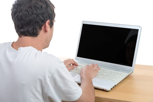 young man working with his laptop on the white background