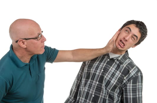a father gives his son a slap on the white background