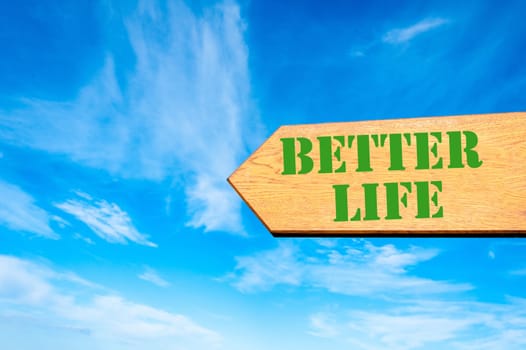 Wood arrow sign against clear blue sky with Better Life, Lifestyle change concept