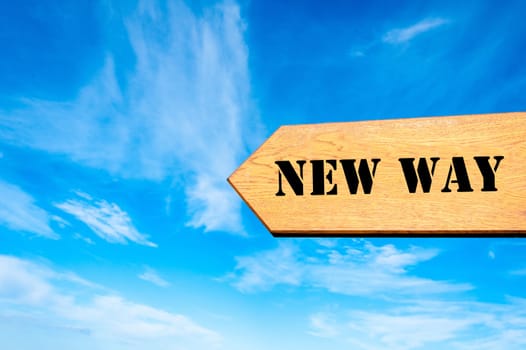 Wood arrow sign against clear blue sky with with New Way message, Strategy conceptual image