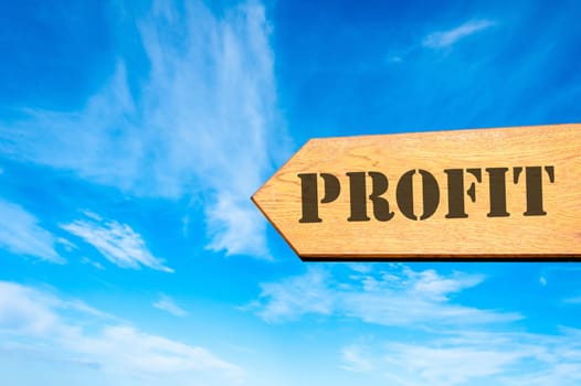Wood arrow sign against clear blue sky with Profit message, Business rentability concept