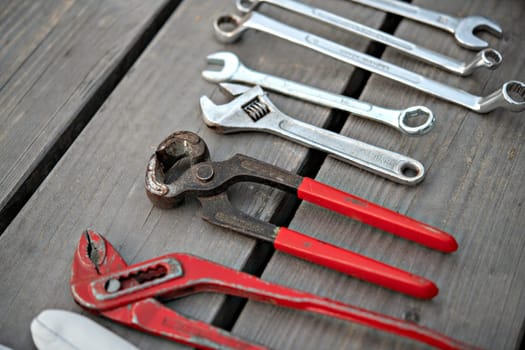 different tools on gray wooden ground