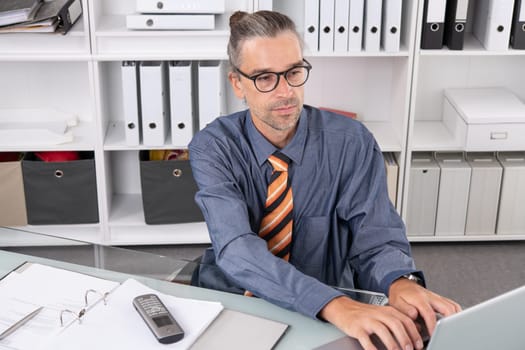 disabled business man in wheelchair working in the office