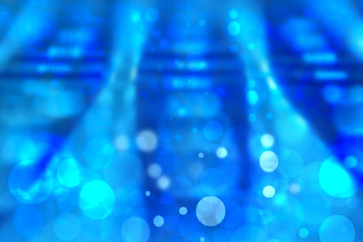 Abstract blurred blue bokeh background with colorful circles. Beautiful texture for advertising.