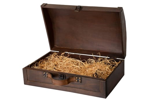 Opened old wooden chest with a leather handle, filled with wood wool isolated on white background. Space for text display montage.