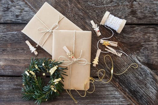 Presents and decoration in christmas on rustic wooden background