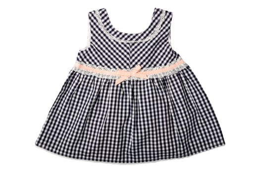 Clothes for children. A black and white checkered dress with pink loop isolated on white background. Children fashion.