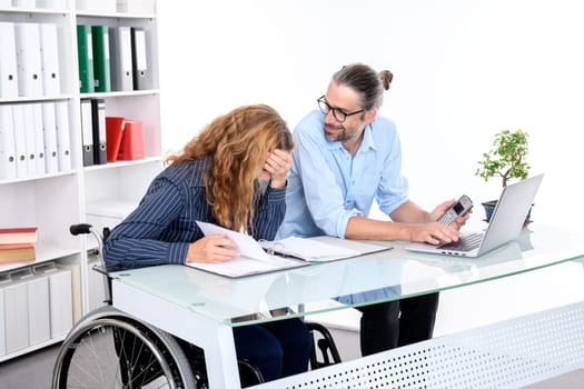 young businessman and businesswoman working together in the office