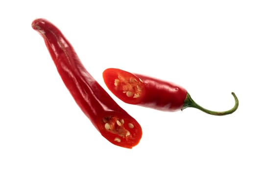 Transversal cut of a Red Cayenne. Red Cayenne pepper is a type of Capsicum annuum. It is usually a moderately hot chili pepper used to flavor dishes.