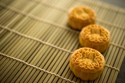 Mooncakes is traditionally baked pastry to eaten during Mid-Autumn Festival. The Chinese character represent "lotus paste""."