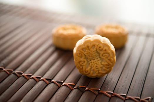 Moon cakes is traditionally baked pastry to eaten during Mid-Autumn Festival. The Chinese character represent "lotus paste"" in English."