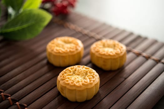 Moon cakes is traditionally pastry to eaten during Mid-Autumn Festival. The Chinese character represent "lotus paste""."