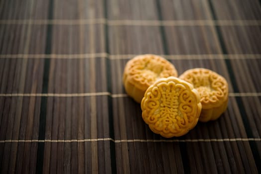 Traditional mooncakes is offered to friends or family during Mid-Autumn Festival. The Chinese character represent "lotus paste"" in English."