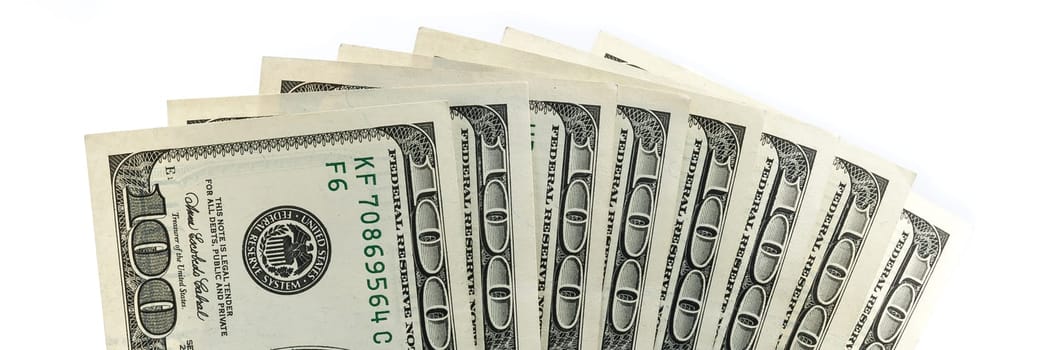 Parts of the $ 100 bills are fan-shaped from the bottom.