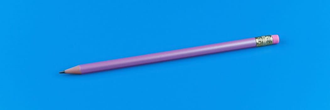 One purple pencil on a blue background.