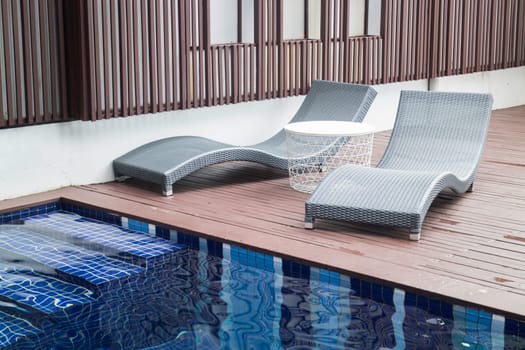 Small backyard with small swimming pool spa, stock photo