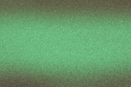 Granite background of green color with small dots.