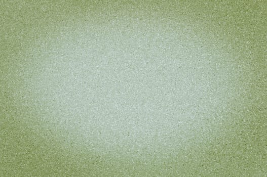 Background of polished granite texture is light khaki with vignetting.