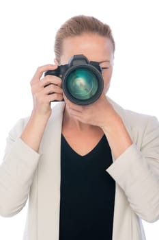 Female photographer taking images with dslr camera isolated on white background.