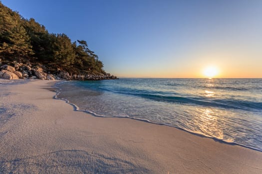 Sunrise in Marble beach (Saliara beach), Thassos Islands, Greece. The most beautiful white beach in Greece