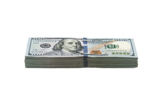 Ten thousand dollars in a pack of one hundred dollars. View at an angle.