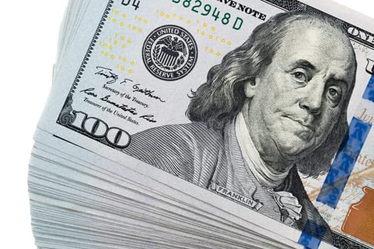 Part of a pack of one hundred dollars with a shift. Close-up.