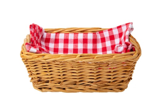 Empty basket therein a red checkered napkin isolated on white background. For your food and product display montage.