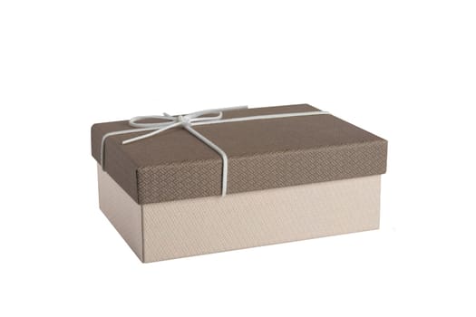 Present or gift box with white ribbon bow isolated on a white background. Birthday, valentine or other holidays.