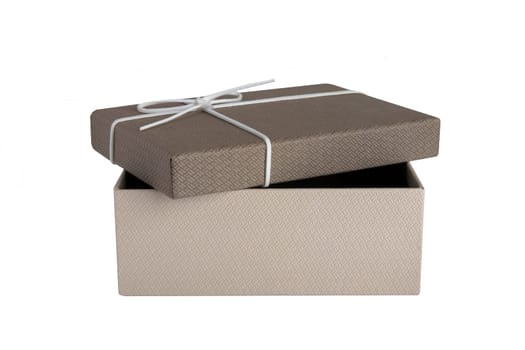 Present or gift box with white ribbon bow isolated on a white background. Birthday, valentine or other holidays.