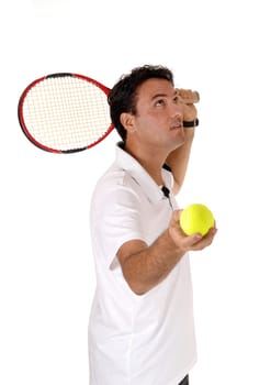 A handsome young man in a white shirt holding his yellow ball ready.for a swing with his racket, isolated for white background.