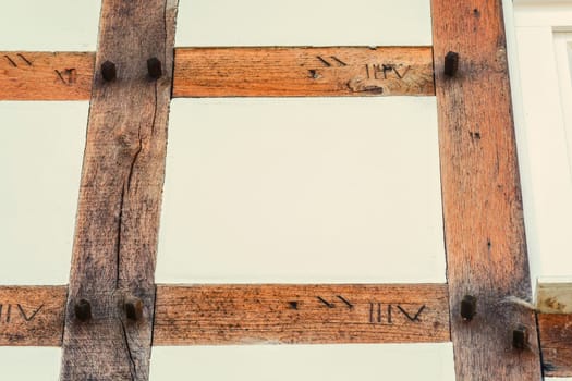 Old historic half-timbered beams with signs so-called Abbundzeichen - Bundzeichen.