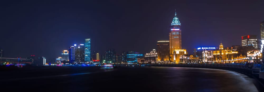 night shanghai skyline with reflection ,beautiful modern city