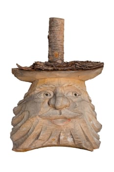 A old carved wooden tree sculpture shows face from a man. Carved sculpture is isolated on white background.