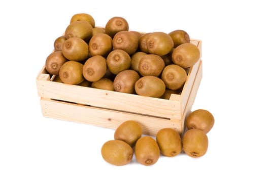 Wooden Box filled with many ripe and fresh Kiwi fruits and othter fruits in front of it isolated on white background